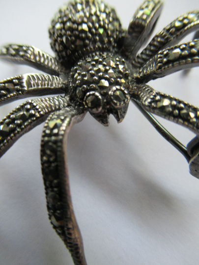 Iconic Spider Brooch, Wiki