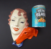 Load image into Gallery viewer, ART DECO Royal Dux, Czechoslovakia Wall Mask. 1930s Lady with Strange Hollow Eyes and Abstract Orange Borzoi Hound Dog
