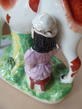 Load image into Gallery viewer, Genuine ANTIQUE STAFFORDSHIRE Figurine. Woman / Milkmaid with Large Cow by a Stream; 1880s
