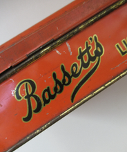 Load image into Gallery viewer, Vintage 1930s Art Deco Bassett&#39;s Liquorice All-sorts in Orange Tin
