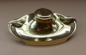 ART NOUVEAU / JUGENDSTIL Brass Inkwell with tendril handles and feet. Marked Geschutzt on the Base