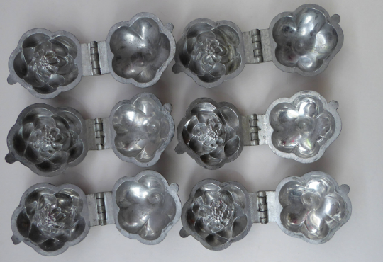 Antique Set of SIX Aluminium Chocolate Moulds. Very Substantial Items in the Form of Lotus Flowers