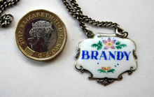Load image into Gallery viewer, VINTAGE Silver and Enamel BRANDY Decanter or Bottle Label Birmingham Hallmarked 1957
