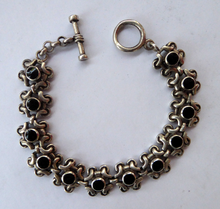 Load image into Gallery viewer, Vintage SOLID SILVER Bracelet with Abstract Floral Design &amp; Black Enamel Details. SIGNED; probably Scandinavian
