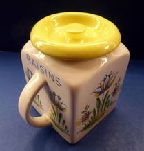 Load image into Gallery viewer, 1950s BRISTOL POTTERY Kitchen Canister or Storage Jar. Vintage Old Delft Tulip Design with Carrying Handle. RAISINS
