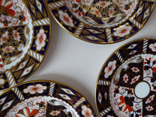 Load image into Gallery viewer, ROYAL CROWN DERBY Imari Pattern 2451. Four vintage side plates or tea plates. Diameter 6 1/4 inches
