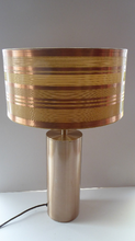 Load image into Gallery viewer, 1960s Vintage Table Lamp with Tubular Gold Tone Metal Cylindrical Body and Original Metallic Stripes Drum Shade
