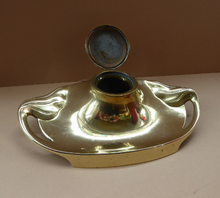 Load image into Gallery viewer, ART NOUVEAU / JUGENDSTIL Brass Inkwell with tendril handles and feet. Marked Geschutzt on the Base
