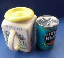 Load image into Gallery viewer, 1950s BRISTOL POTTERY Kitchen Canister or Storage Jar. Vintage Old Delft Tulip Design with Carrying Handle. RAISINS
