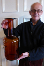 Load image into Gallery viewer, EXTRA LARGE Scandinavian GUL Vase or Bottle Vase. Designed 1962 by Otto Brauer for Holmegaard Glass, Denmark. Rich Brown / Dark Amber Colour
