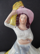 Load image into Gallery viewer, Antique Victorian STAFFORDSHIRE Figurine. Harvesting Subject. Lady on Horseback Carrying Sheaves of Wheat. HOME
