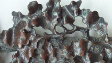 Load image into Gallery viewer, Antique 1880s BLACK FOREST MIRROR Frame in the form of an easel stand; decorated with intricate carvings of oak leaves &amp; acorns
