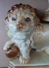 Load image into Gallery viewer, LARGE PAIR of ANTIQUE Staffordshire Style Medici Lions with front paw on ball. 14 inches in length
