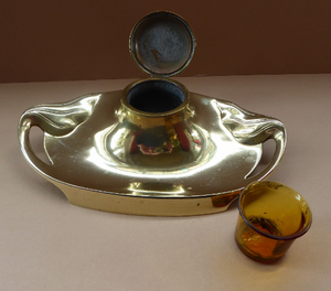 ART NOUVEAU / JUGENDSTIL Brass Inkwell with tendril handles and feet. Marked Geschutzt on the Base
