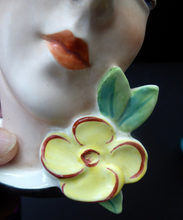 Load image into Gallery viewer, ART DECO Royal Dux, Czechoslovakia Wall Mask. 1930s Lady with Stylish Flapper Hat and Yellow Flower on her Lapel
