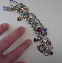 Load image into Gallery viewer, SILVER BRACELET with 36 Vintage SILVER and Enamel Towns Charms. Souvenirs of a Visit to the Town
