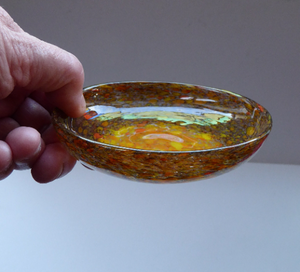 Wee SCOTTISH MONART GLASS Shallow Pin Dish. Mottled Orange, Red, Yellow and Brown Glass with Gold Aventurine & Customary Raised Pontil Mark