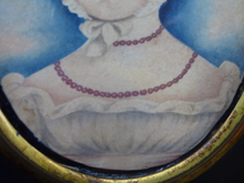 Load image into Gallery viewer, ANTIQUE Portrait Miniature of a Young Lady. Watercolour Study in Antique Black Wooden Frame with Acorn Hanging Ring; c 1830s
