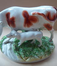 Load image into Gallery viewer, ANTIQUE STAFFORDSHIRE Figurine. Large Cow with her White Calf on Raised Oval Base; 1880s
