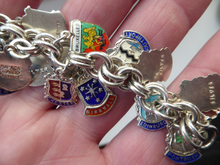 Load image into Gallery viewer, SILVER BRACELET with 36 Vintage SILVER and Enamel Towns Charms. Souvenirs of a Visit to the Town
