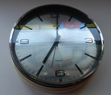 Load image into Gallery viewer, Vintage 1970s METAMEC White Plastic and Chrome Wall Clock. Good Vintage Condition with Second Hand. Battery Operated
