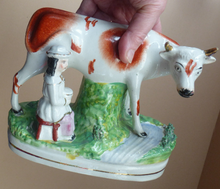Load image into Gallery viewer, Genuine ANTIQUE STAFFORDSHIRE Figurine. Woman / Milkmaid with Large Cow by a Stream; 1880s
