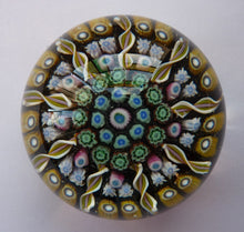 Load image into Gallery viewer, Gorgeous Colours. Scottish Glass - Strathearn Millefiori Canes and Latticino Nine Spoke Paperweight
