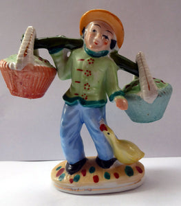 1960s Salt and Pepper Set or Cruet; Taking the Form of a Chinese Man Carrying Baskets on a Pole