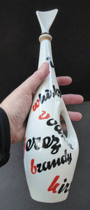 Vintage 1960s Amorphic White Porcelain Drinks / Cocktails Bottle or Decanter. Embellished with the names of drinks.