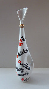 Vintage 1960s Amorphic White Porcelain Drinks / Cocktails Bottle or Decanter. Embellished with the names of drinks.