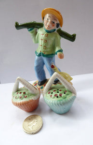 1960s Salt and Pepper Set or Cruet; Taking the Form of a Chinese Man Carrying Baskets on a Pole