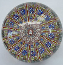 Load image into Gallery viewer, LARGE Vintage Scottish PERTHSHIRE Paperweight. Sugar Pink Ground, 15 Spokes &amp; Millefiori Canes. P Cane in Center
