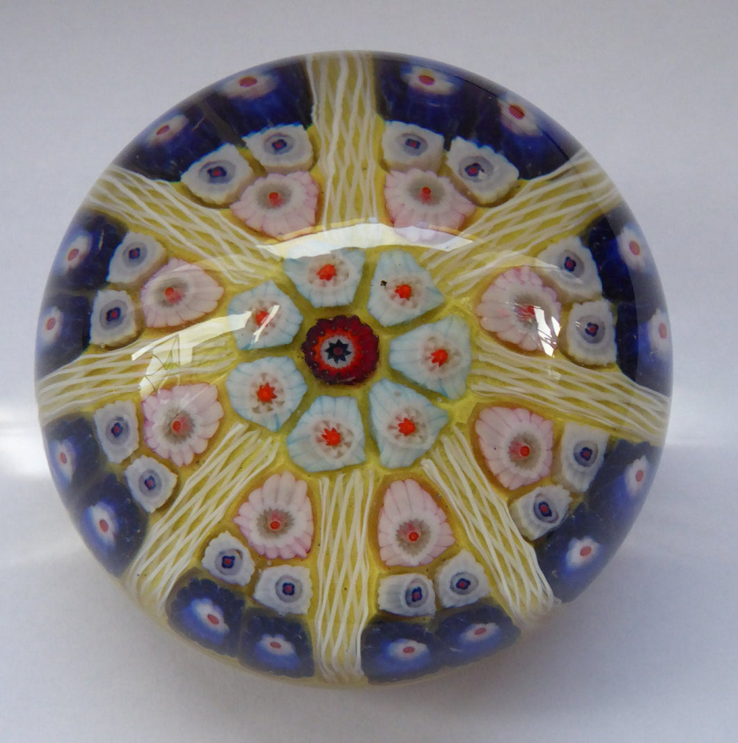 Beautiful VASART Scottish Glass Paperweight with 8 Spokes; with yellow ground, latticino canes & millefiori