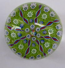 Load image into Gallery viewer, Vintage Scottish PERTHSHIRE Paperweight. Pea Green Ground, 11 Spokes &amp; Millefiori Canes. P Cane in Center
