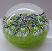 Load image into Gallery viewer, Vintage Scottish PERTHSHIRE Paperweight. Pea Green Ground, 11 Spokes &amp; Millefiori Canes. P Cane in Center
