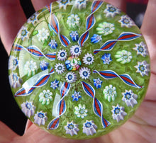 Load image into Gallery viewer, Vintage Scottish PERTHSHIRE Paperweight. Pea Green Ground, 11 Spokes &amp; Millefiori Canes. P Cane in Center
