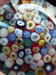 Vintage Scottish Paperweight, possibly by STRATHEARN GLASS. Scarlet Ground with a Carpet of Millefiori Canes