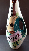 Load image into Gallery viewer, Vintage 1960s Amorphic White Porcelain Drinks / Cocktails Bottle or Decanter. JEREZ: Embellished with image of Spanish Guitar
