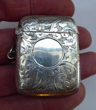 Load image into Gallery viewer, Sweet BIRMINGHAM 1905 Solid Silver Vesta with Profuse Scrolling Decoration. Good Antique Condition
