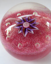 Load image into Gallery viewer, Exquisite Paul Ysart HARLAND PAPERWEIGHT; with Pink Ground,  Glitter Flowerpiece and Controlled Air Bubbles. Signed with H Cane

