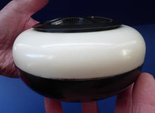 Load image into Gallery viewer, Very Rare Art Deco Early Bakelite Box / Powder Bowl. The top section is white &amp; the bottom half is black
