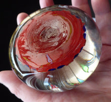 Load image into Gallery viewer, Beautiful VASART Scottish Glass Paperweight with 9 Spokes; with scarlet ground, latticino canes &amp; millefiore. 3 inches diameter
