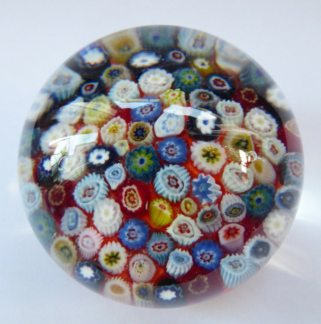Vintage Scottish Paperweight, possibly by STRATHEARN GLASS. Scarlet Ground with a Carpet of Millefiori Canes