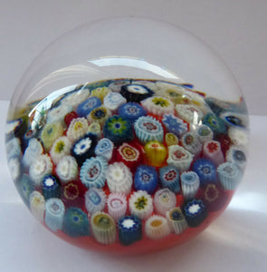 Vintage Scottish Paperweight, possibly by STRATHEARN GLASS. Scarlet Ground with a Carpet of Millefiori Canes
