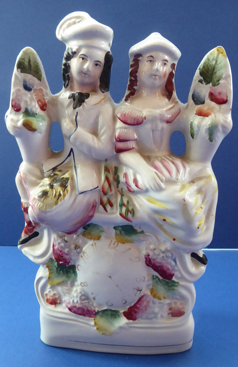 ANTIQUE Victorian Staffordshire Figurine. Poor Man's Clock. Two Highland Figures with Fruiting Vine