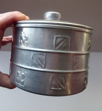 Load image into Gallery viewer, Aluminium Biscuit Box - Modelled on a Pewter Arts &amp; Crafts Design  which was originally made for Liberty by Archibald Knox
