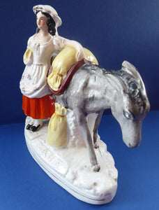 19th Century Staffordshire Figurine. Rare Antique  SAND Model of a  Lady with a Grey Donkey, Gathering Sand into Sandbags