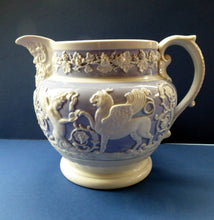 Load image into Gallery viewer, Extremely Rare 1820s RIDGWAY GRIFFIN and Mask Head Jug or Pitcher. Lilac Ground with Applied White Sprigware Decoration
