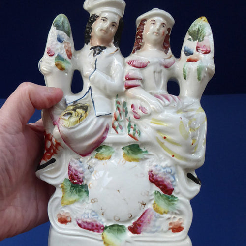 ANTIQUE Victorian Staffordshire Figurine. Poor Man's Clock. Two Highland Figures with Fruiting Vine