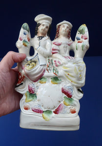 ANTIQUE Victorian Staffordshire Figurine. Poor Man's Clock. Two Highland Figures with Fruiting Vine